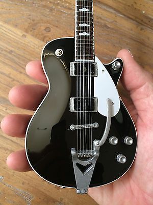 THE BEATLES - GEORGE HARRISON - BLACK DUO ELECTRIC MINI GUITAR - Image 2