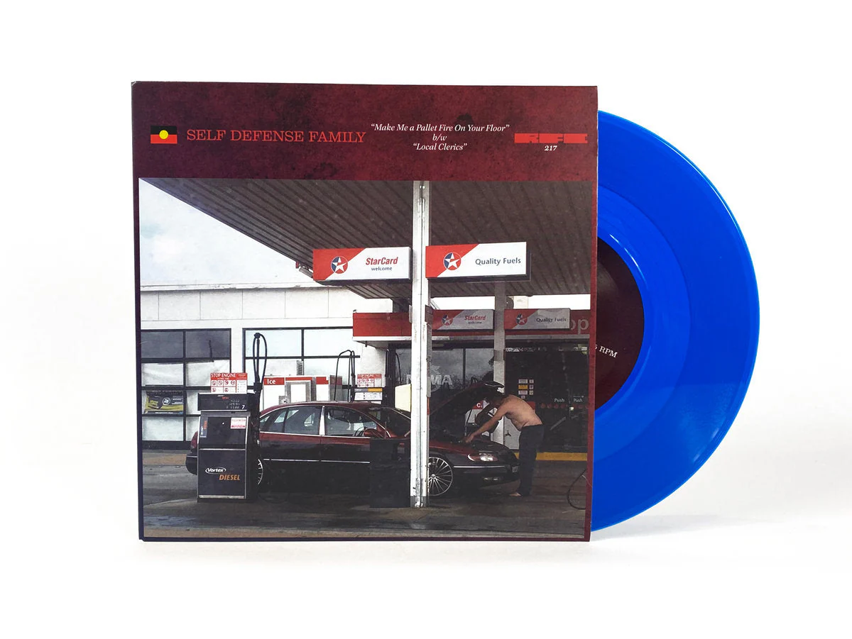 SELF DEFENSE FAMILY 'MAKE ME A PALLET FIRE ON YOUR FLOOR / LOCAL CLERICS' 7" - BLUE